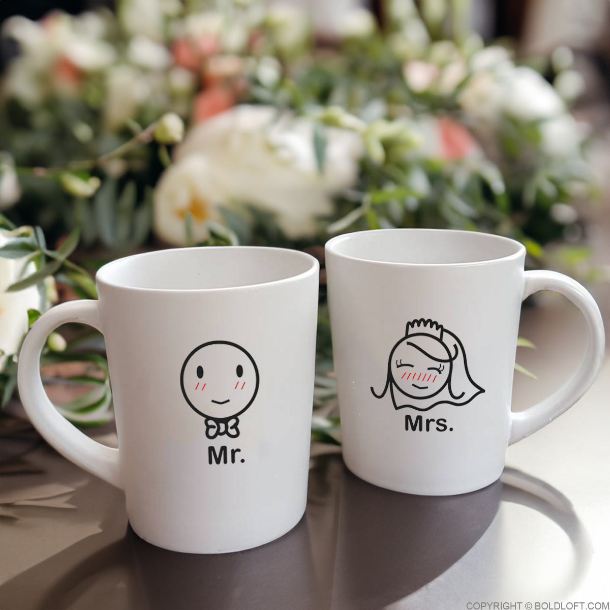 Adorable Mr Mrs wedding coffee mugs from BoldLoft showcasing bride and groom characters. Perfect wedding and engagement gifts for him and her.