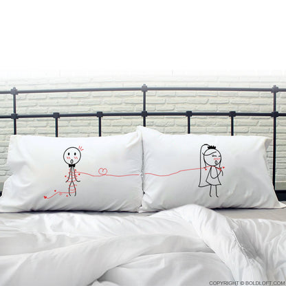 Capture the charm of the Tie the Knot design on romantic couple pillowcases, featuring two endearing stick figure representations of a bride and groom, perfect for wedding couples.