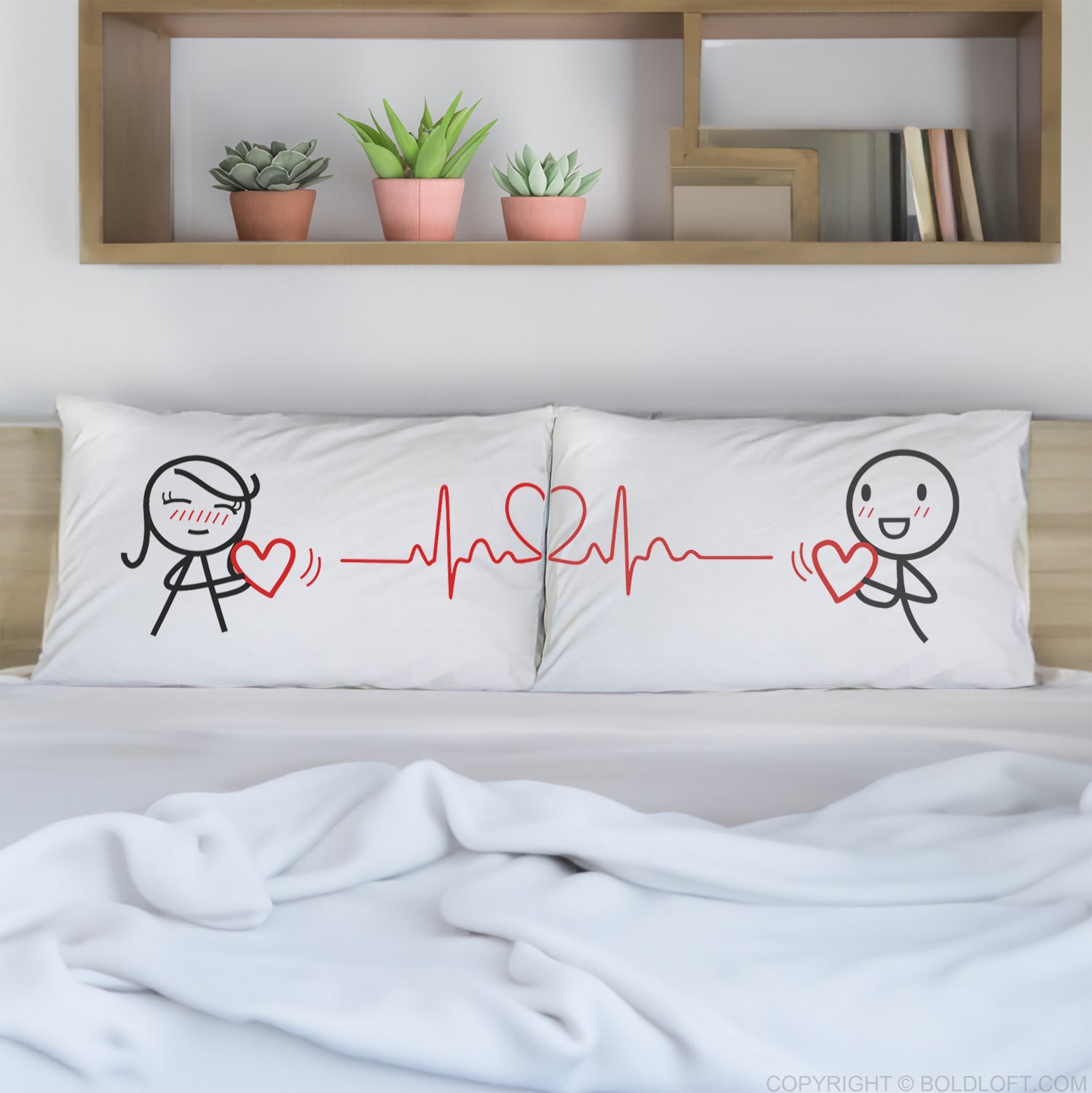 BoldLoft Beat of My Heart Couple Pillowcases, these covers embody love, complemented by a heartfelt gesture between 2 stick figures.