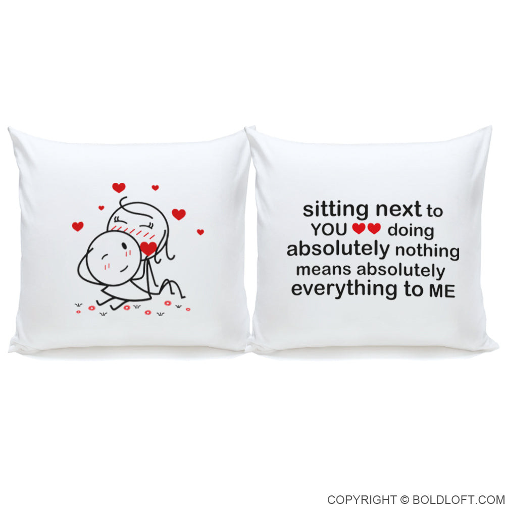 BoldLoft You Mean Everything to Me Euro Pillow Covers-Two white pillows with a pair of cute stick figure couple in romantic  designs and text on a pair of white euro pillow covers.