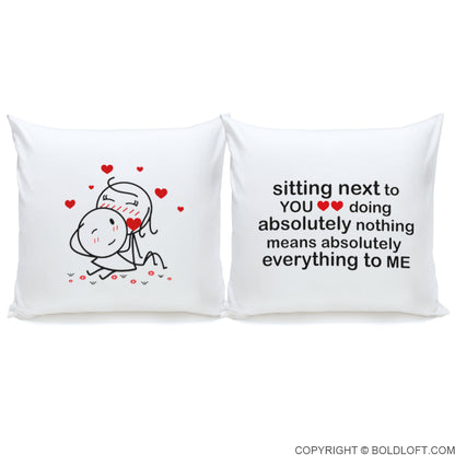 BoldLoft You Mean Everything to Me Euro Pillow Covers-Two white pillows with a pair of cute stick figure couple in romantic  designs and text on a pair of white euro pillow covers.