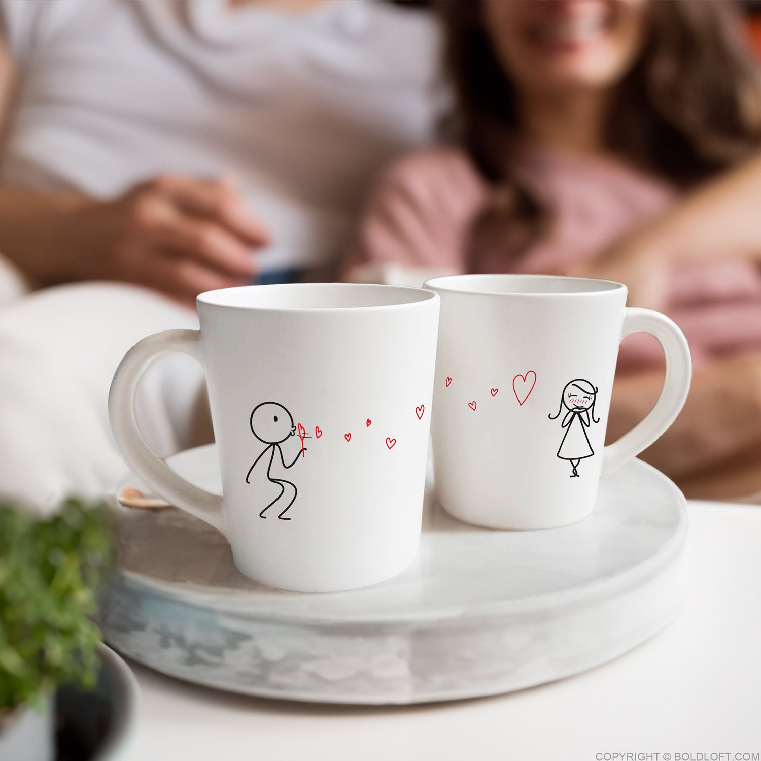 BoldLoft From My Heart to Yours Couple Mugs for Him and Her feature heart-felt design with a boy blowing heart-shaped bubbles to a girl